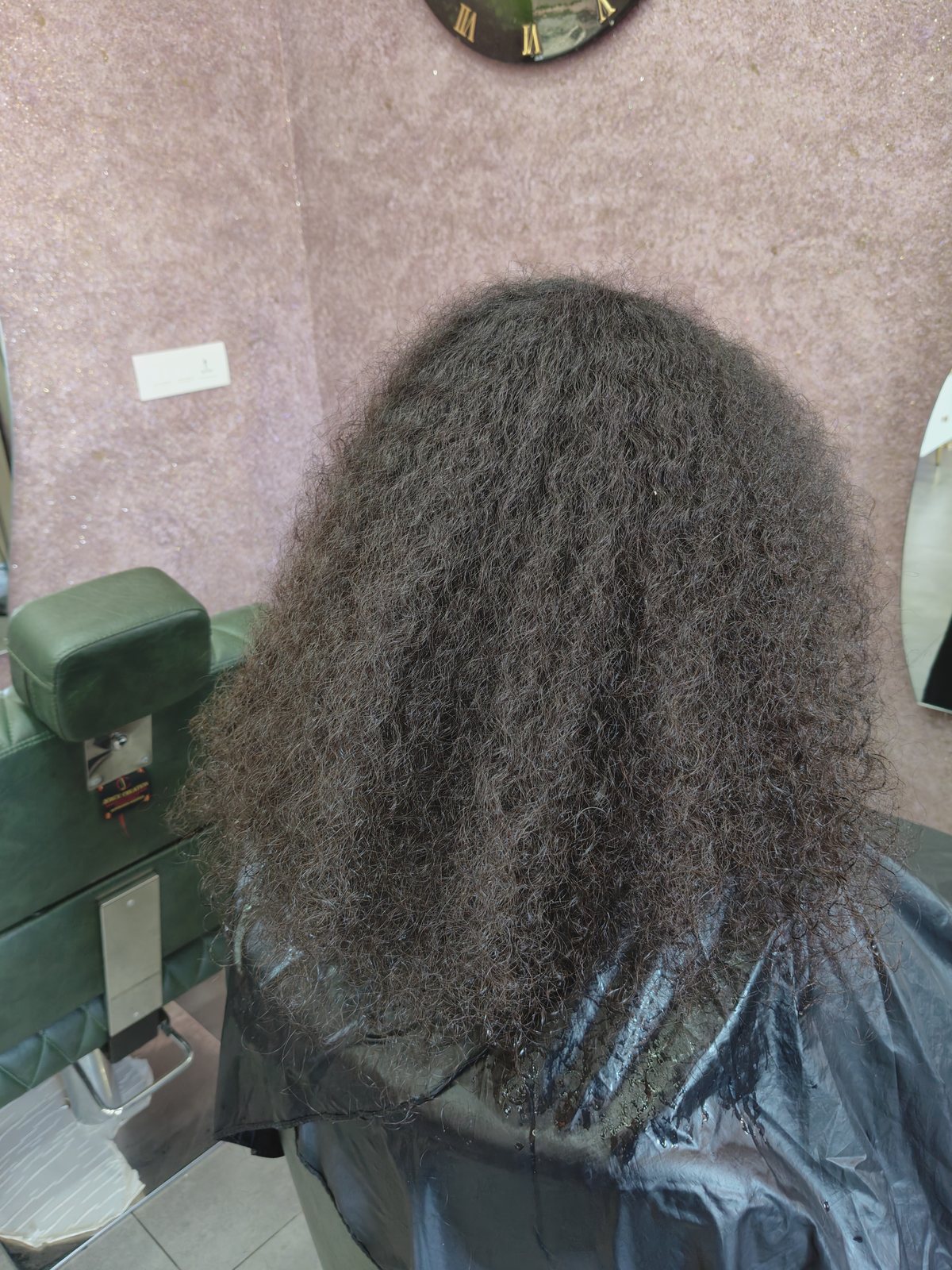 A guest's hair before Hair Botox, dry and tightly frizzed